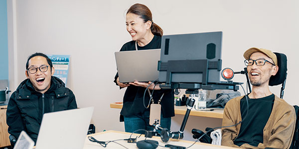 computer user with disability and research team